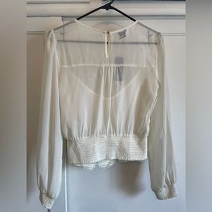 Bebe sheer top